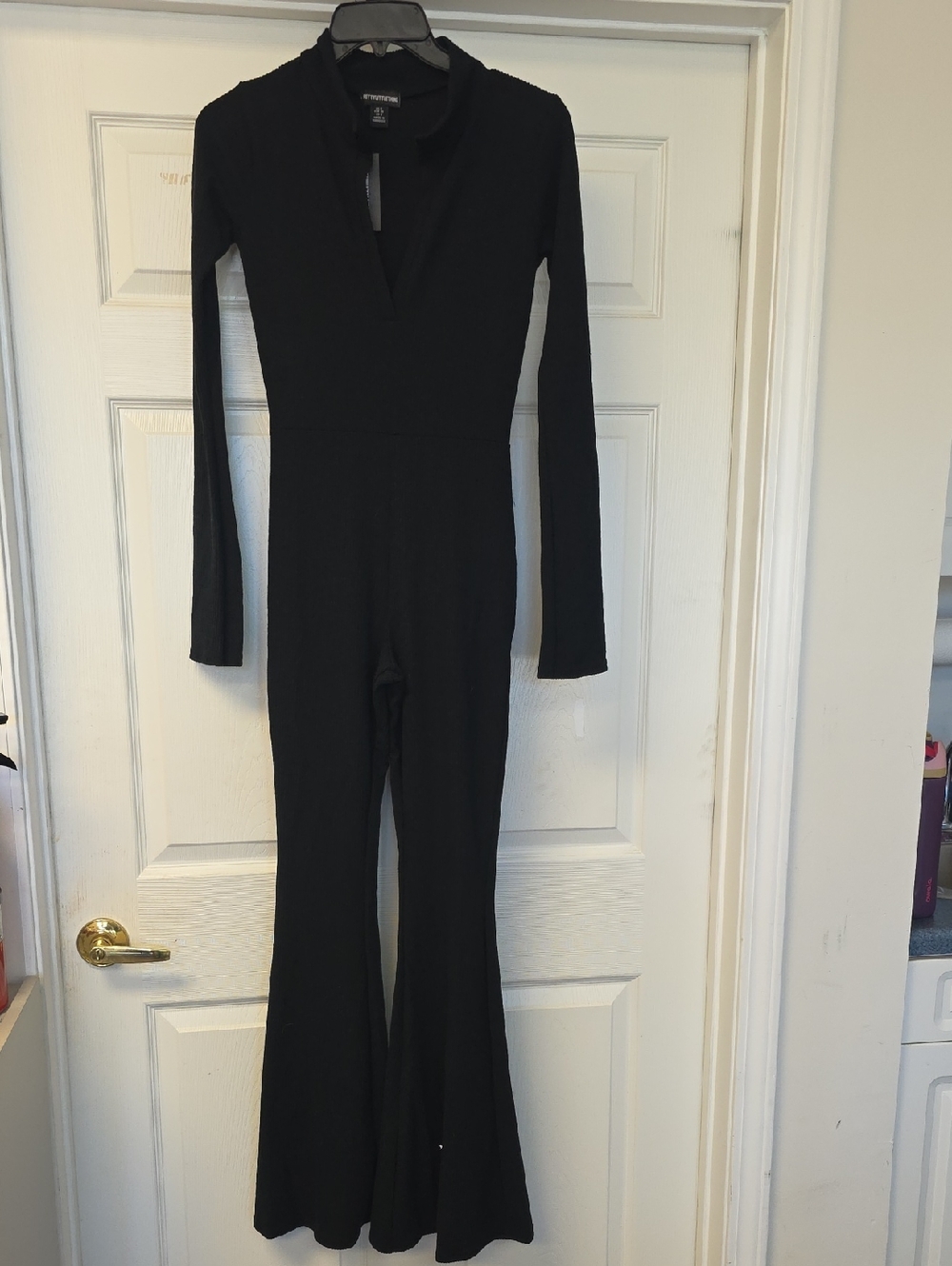 PrettyLittleThing Black Long-Sleeve Flared Jumpsuit